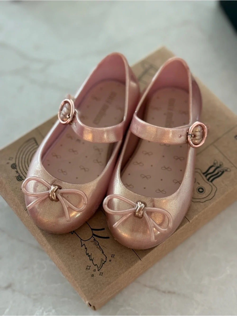 Mini Melissa Metallic Rose Gold Mary Janes with Bow Accent